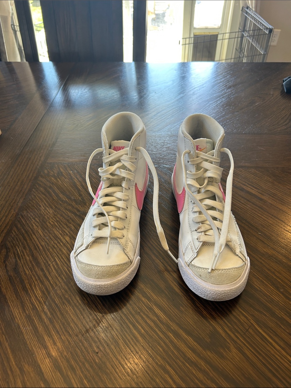 Nike High-Top Sneakers in White with Pink Swoosh